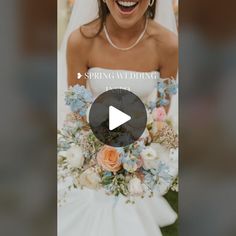 a woman in a wedding dress holding a bouquet with flowers on it and smiling at the camera