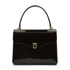 Royale Handbag in Patent Black/BlackOf true royal pedigree, these soft leather handbags are a favorite of H.M. Queen Elizabeth II. An elegant blend of linear and curved forms, this piece is wonderfully British. Designed and manufactured by Launer London, this piece is crafted to the highest possible standards. Only the finest calfskin leathers sourced from Italy are used to create this piece. The interior is equally striking and features fine Italian suede linings.While we do not stock this piec Launer London, Classy Bags, High End Handbags, Modern Handbag, Book Diary, Statement Handbag, Luxury Leather Bag, Soft Leather Handbags, Reine Elizabeth