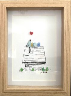 a drawing of a bird sitting on top of a roof with hearts flying above it