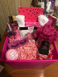 a pink basket filled with personal care items