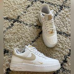 White And Tan Air Force 1 Low With Gold Accent. Worn A Couple Of Times. 8 Women’s Tan Air Force 1, Nike Shoes White, White Nike Shoes, Air Force 1 Low, Gold Accent, Shoes White, White Nikes, Air Force 1, Cream White