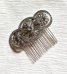 ♡ RHINESTONE HAIR COMB ♡ Perfect for wedding guests / brides  ♡ Perfect for a range of occasions  ♡ Suitable for all hair types ♡ Order will be sent via Royal Mail ♡ APPROXIMATE ITEM SPECIFICATIONS: Length: 7.5cm / 3 inches  Width: 2.5cm / 1 inch ♡Prettylittlebridal x Bridesmaid Hair Jewelry, Graduation Hair, Wedding Hair Clip, Jewelry Prom, Hair Decor, Wedding Barrettes, Rhinestone Hair Comb, Elegant Wedding Hair, Graduation Hairstyles