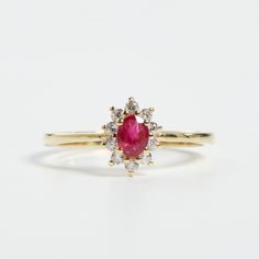 Classic Ruby Cluster Ring With Center Stone, Classic Cluster Ruby Ring With Center Stone, Classic Ruby Ring With Diamond Accents In Cluster Shape, Classic Ruby Ring With Diamond Accents Cluster, Classic Ruby Crystal Ring, Classic Diamond Birthstone Ring With Halo, Classic Diamond Halo Birthstone Ring, Ruby Birthstone Ring, Ring Gold Wedding