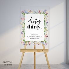 an easel with a sign that says dirty thirty