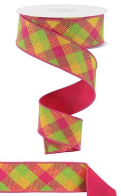 a pink and green plaid ribbon with two different colors on the side, one has a white