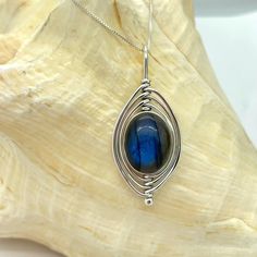 Beautiful Blue Labradorite Sterling Silver Wrap Design Pendant With 18” Diamond Cut Sterling Silver Chain. All Items Come Gift Boxed. Labradorite Blue Necklace As Gift, Nickel-free Blue Labradorite Jewelry, Wired Jewelry, Stone Wrapping, Sterling Silver Wire Wrap, Cabochon Pendant, Blue Labradorite, Shop Ideas, Hand Made Jewelry