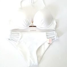 Victoria's Secret 2 Piece Bundle: This Bundle Includes The Following: 34a Bombshell Bikini Top Bombshell Adds 2 Cups Sizes New W Tags Attached & Bottoms Size Small New W Tags Attached No Trades # Keywords: Bikini, Bikini Set, Swimming Suit, Bathing Suit, Swimwear, Bombshell Bikini Top, Miraculous Bikini Top, Push Up Bra Chic White Swimwear With Padded Cups, Elegant White Swimwear With Padded Cups, White Fitted Victoria's Secret Swimwear, Swimming Suit, Victoria Secret Swim, Push Up Bra, 2 Cups, Bathing Suit, Womens Swim