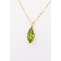 6.88 Carat Peridot Solitaire Pendant Necklace in 14K Yellow Gold Rope Chain. Statement pendant necklace with an astonishing marquise cut, 2-prong set peridot stone dangling from the chain in a vibrant yellowish-green color. The contrast of the yellow gold with the lime green of the rope chain is a sight to be seen. The pendant would pair and layer perfectly with other simpler gold colored necklaces. The pendant is 18 inches long and weighs 1.69 grams. The stone measures 25 x 9 mm and bears moderate cleanliness with excellent color.   Item Details: Item Type: Pendant Necklace Gemstone: Peridot Metal: 14K Yellow Gold Closure: Spring Ring Chain Type: Rope chain Weight: 1.69 Grams Length: 18 inches  Gemstone Details: Type: Peridot Carat: 6.88 Cut: Marquise Color: Yellowish Green  Setting: 2 pr Pink Pendant Necklace, Purple Pendant Necklace, Art Deco Pendant Necklace, Black Pendant Necklace, Blue Pendant Necklace, Ruby Necklace Pendant, Sapphire Necklace Pendants, Yellowish Green, Peridot Pendant