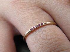 Ruby Wedding Band Solid Gold 14k Jewelry, Eternity Band Ruby, Half Eternity Ring, Ruby Stacking Ring, Wedding Ring Ruby FREE SHIPPING Solid Gold Gold KT: solid gold 14k Gold color: White gold, rose gold, yellow gold Available in solid gold 18kt Stones Ruby shape: Round Ruby size: 5x1mm Total weight: 0.03ct Number Stones: 5 Width of band: 1.30 mm SIZING From 3US to 9US For other size, please contact me CUSTOM & PERSONALIZED ORDERS If you have an idea, we make personalized orders Contact us GI Wedding Ruby Eternity Band In Yellow Gold, Wedding Yellow Gold Ruby Eternity Band, Ruby Eternity Band With Prong Setting For Wedding, Wedding Stackable Ruby Rings In Gold, Stackable Ruby Eternity Band For Weddings, Wedding Ruby Eternity Band In Fine Jewelry Style, Ruby Eternity Band For Wedding, Wedding Ruby Ring In White Gold With Half Eternity, White Gold Ruby Ring With Half Eternity For Wedding