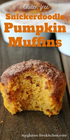 a close up of a muffin on a wooden table with the words, gluen free snickkerdoodle pumpkin muffins