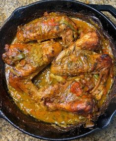 some food is cooking in a pan on the stove top and ready to be eaten