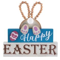 a wooden sign that says happy easter with two bunny ears on it and an egg in the middle