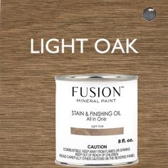 a brown and white paint with the words fuson painted on it's side