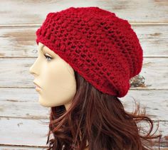 "Style: Slouchy crochet puff stitch hat. Color: This sample hat is shown in Cranberry Red, a deep cool toned red. You can choose from 32 colors. Please see the last photo in the listing and zoom in for a visual reference of your color choices, then select it from the drop down menu when ordering. Sizes: One size fits average teen or adult head size of 20\" to 23\" (50.5 cm to 58 cm). Fiber Content: 80% acrylic, 20% wool Characteristics: Whimsical, chunky, very soft, warm and cozy. Care Instructi Crochet Puff Stitch Hat, Puff Stitch Hat, Slouchy Beanie Crochet, Crochet Puff Stitch, Slouchy Winter Hat, Crochet Hat With Brim, Hipster Hat, Stitch Hat, Girlfriends Day