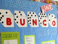 a bulletin board with dominos on it and the words family prizes, bunco night