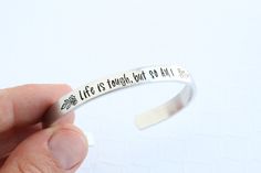 "When someone you care about needs a thoughtful gift, send her a cuff bracelet with an inspirational quote. It's the perfect \"thinking of you gift\" or best friend gift. Pick them up and push them forward with the reminder that life is tough, but so are you! Add a gift box here: https://www.etsy.com/listing/657110617/add-a-gift-box-to-your-order?ref=shop_home_active_1&frs=1 Details -- Made from 1/4\" wide aluminum, cuff bracelet is lightweight, non-tarnish, and hypoallergenic (nickel-free!) Inspirational Personalized Cuff Bracelet For Friendship, Inspirational Hand Stamped Cuff Bracelet Gift, Inspirational Personalized Cuff Bracelet For Gifts, Personalized Inspirational Cuff Bracelet For Everyday, Inspirational Personalized Cuff Bracelet Gift, Personalized Inspirational Cuff Bracelet Gift, Personalized Everyday Meaningful Cuff Bracelet, Everyday Personalized Meaningful Cuff Bracelet, Everyday Inspirational Personalized Cuff Bracelet