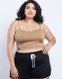 Forget about uncomfortable underwires and padded bras this summer and stick to the basics in the Curve Easy As That Undershirt. Made for comfort and support, this stretchy cropped tank is perfect for layering under any top or dress, while still maintaining comfort. Wear this bralette top under any loose fitted dress or top, or pair it with some comfy shorts or joggers for a super comfy "chill at home" look. Model is 5'10", bust 43", waist 36", hips 49", and is wearing a size 1XL. Materials and C Cheeky Shorts, House Clothes, Loose Fitting Dresses, Bralette Tops, Flowy Dress, Petite Outfits, Boy Shorts, Crop Tank, Plus Size Tops