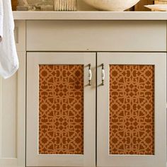 a bathroom with a sink and cabinets in it