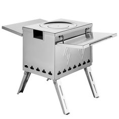 an outdoor stove with the door open and legs extended to show it's cooking area