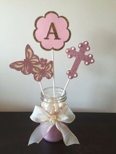 pink and gold cupcake toppers in a mason jar