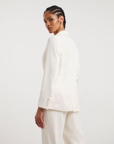 Perfect for an elegant wedding or rehearsal dinner. This sophisticated ivory, fitted bridal suit is crafted from a luxurious satin back crepe. Its structured lapels skims the jacket beautifully, and features a single-button closure. This stunning bridal suit jacket is fully lined with front pockets, and long sleeves with button detailing. A modern statement on classic look. Pair with matching trousers to for a complete head-to-toe look (code WI530). Bridal Suit, Matching Swimwear, Sports Skirts, Jd Williams, Loungewear Shorts, Tailored Jacket, Dress With Cardigan, Rehearsal Dinner, Swim Dress