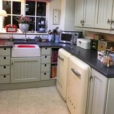 the kitchen is clean and ready to be used for cooking or baking, as well as other things in the cupboards