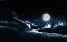 the full moon shines brightly in the dark night sky above some fluffy white clouds