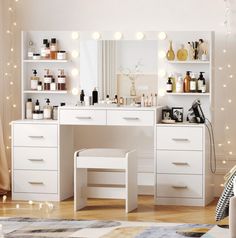 a white vanity with lights on the wall