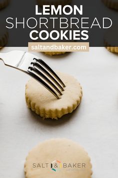 lemon shortbread cookies on a baking sheet with a fork in the middle and text overlay that reads, lemon shortbread cookies