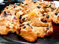 blueberry muffins are on a plate ready to be eaten