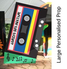 an old school cassette tape is on display in front of a white tent with the words la rege personal project written below it