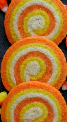 several orange and yellow circles are arranged in a row on top of each other,