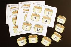 four cards with numbers and pictures of pots on them