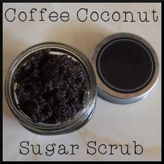 a jar filled with sugar scrub sitting on top of a table