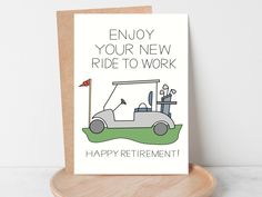 a happy retirement card with a golf cart and flag on the front, says enjoy your new ride to work