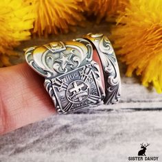 A rare antique sterling silver Masonic spoon was transformed into a stunning piece of wearable art. Freemasonry is a fraternal organization that emphasizes moral and philosophical teachings, rituals, and symbols to promote personal development and social betterment among its members. This ring features symbolism of Masonry. This piece would make a lovely statement piece or a unique gift. This ring is made from a vintage sterling silver spoon, 925, nickel-free. This ring will be adjusted to the size you request but it can easily be tightened or loosened at home should you want a different fit. As these are antique items, there may be minor wear and tear from its past life. Some rings may have engravings or markings. We do not offer any customization or marking removal at this time. Spoon ri Antique Oxidized Finish Engraved Ring As Gift, Handmade Antique Silver Engraved Ring, Vintage Engraved Ring With Oxidized Antique Silver Finish, Unique Antique Silver Engraved Gift Ring, Unique Antique Silver Engraved Ring For Gift, Vintage Engraved Ring In Antique Silver With Oxidized Finish, Antique Engraved Silver Ring, Silver Jewelry With Antique Finish For Commemoration, Antique Silver Engraved Ring For Commemoration