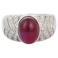 Cabochon ruby diamond cocktail ring in 14K Gold which perfectly goes with your personality and also helps you to improve your energy and sensuality. Designed with oval cut ruby in center and halo of clustered diamonds that makes it a perfect fit to wear it on your wedding or style it with any of your basic outfit to give it a glam. This is a perfect July Birthstone Jewelry also perfect Handmade Jewelry, Bridal Shower Gift, Valentine Gift, Gift For Sister, Mother Daughter Gift, Bride To Be Gift, Luxury Cabochon Ruby Ring For Wedding, Fine Jewelry Cabochon Ruby Ring In White Gold, Luxury Ruby Ring With Oval Cabochon Diamond, Real Ruby Rings, Luxury Ruby Cabochon Diamond Ring, Luxury Silver Ruby Cabochon Ring, Micro Pave Ring, Gold For Sale, Ruby Birthstone