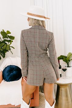 Channel your inner girl boss in our stunning 'Front Row At Fashion Week' romper featuring lightweight material patterned with a brown and natural hued houndstooth print, a wrap front with a single button closure, long sleeves, a collared v-cut neckline, low accent pockets, and a flattering silhouette that ends in a straight mid-thigh length hemline!                                     Measurements S :  Bust 40", Hip 41", Length 28", Sleeve Length 22.5", Waist 40".  M :  Bust 42", Hip 43", Length Trendy Brown Jumpsuits And Rompers For Work, Brown Jumpsuits And Rompers For Work In Fall, Brown Jumpsuits And Rompers For Fall Workwear, V Cuts, Model Fits, Women Clothing Boutique, Hip Length, Front Row, Online Womens Clothing