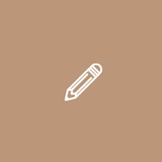 a white pencil on a brown background