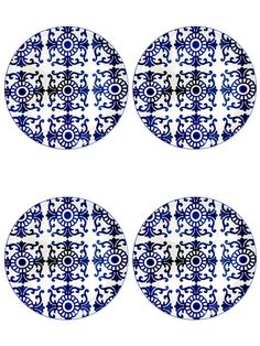 four blue and white plates with designs on them