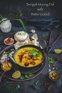 a bowl filled with food sitting on top of a table