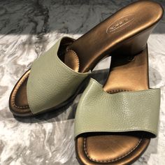 Talbots Leather Slide, Size 5.5 Cushioned Footbed. 2.25 Inch Heel Color: Sage Green, Pale Olive, Mint Never Worn Green Leather Heels With Cushioned Footbed, Green Casual Heels Medium Width, Casual Green Heels Of Medium Width, Casual Green Heels Medium Width, Casual Green Medium Width Heels, Casual Heels With Ortholite Insole And Round Toe, Green Medium Width Slip-on Heels, Navy Blue Sandals, Gold Gladiator Sandals