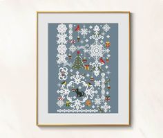 a cross - stitch pattern with christmas decorations and snowflakes on a blue background