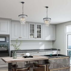 a kitchen with marble counter tops and stools in front of a stove top oven