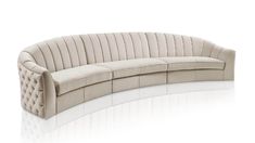 a curved couch with an upholstered back and arms, on a white background