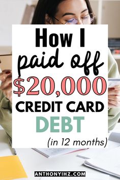 a woman sitting at a desk holding up a sign that reads how i paid off $ 20, 000 credit card debt in 12 months