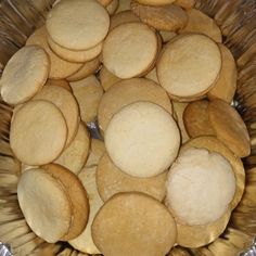 a basket full of cookies sitting on top of a table