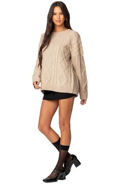 Get cozy for the cooler seasons in this cable-and-diamond-stitch sweater-tunic that's knit from a thick, chunky yarn. Crewneck Long sleeves Ribbed cuffs and hem Machine wash, dry flat Imported Oversized Cable Knit Sweater, Open Stitch Sweater, Stitch Sweater, Sweater Oversized, Sweater Oversize, Sweater Tunic, Cable Stitch, Quarter Zip Sweater, Womens Cashmere