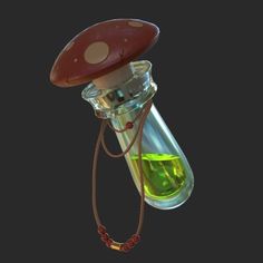 a glass bottle filled with liquid and a mushroom shaped object hanging from it's side