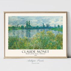 a painting on the wall with water and trees in the background that reads claudia monet banks of the seine, paris